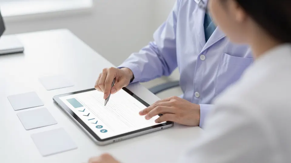 Clinician reviewing a digital healthcare consultation
